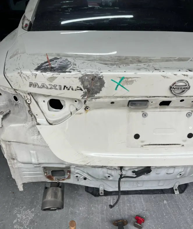 Nissan Murano with rear collision damage before repair at CT Collision in Kissimmee, Florida