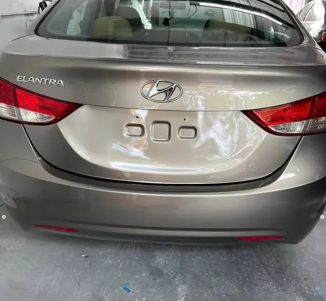 Hyundai Elantra rear bumper repaired and repainted at CT Collision in Kissimmee, Florida