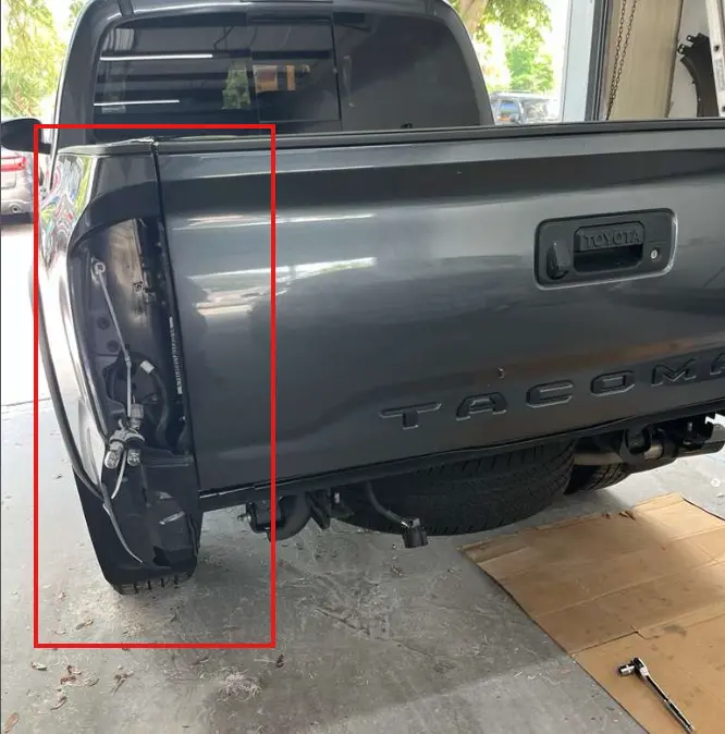 Toyota Tacoma rear body panel damage repaired at CT Collision in Kissimmee, Florida