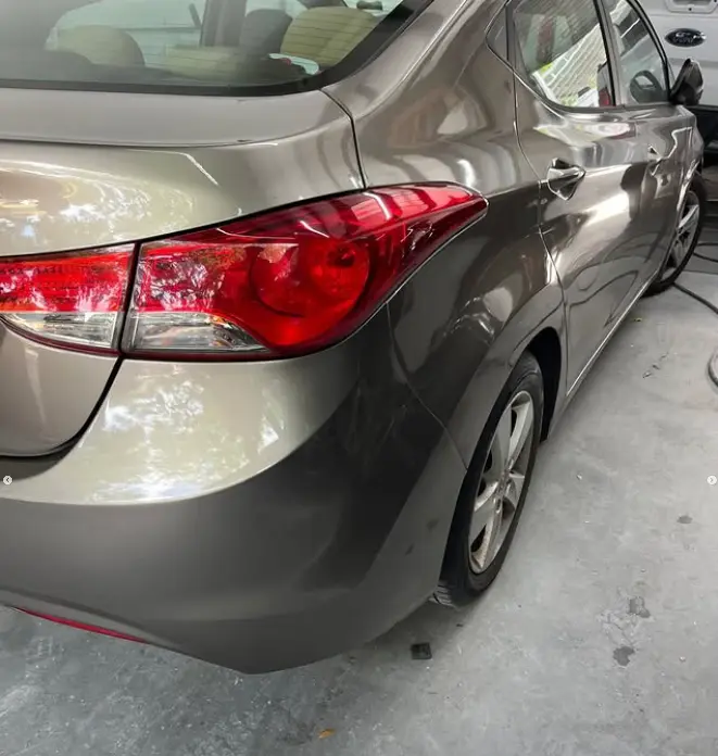 Hyundai Elantra quarter panel fully restored after body repair at CT Collision in Kissimmee, Florida