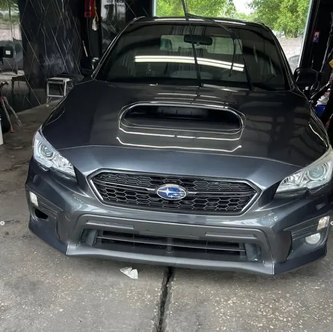 Subaru WRX fully restored after collision repair with factory-perfect body work in Kissimmee, Florida