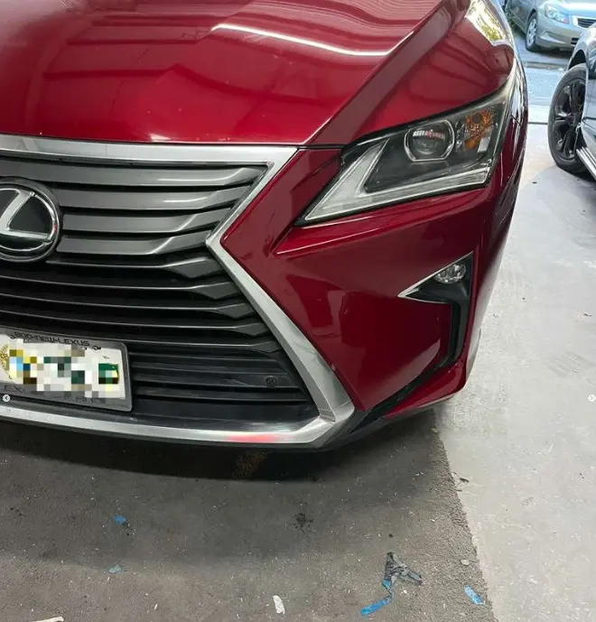 Lexus front bumper fully restored with mirror-gloss paint at CT Collision in Kissimmee, Florida
