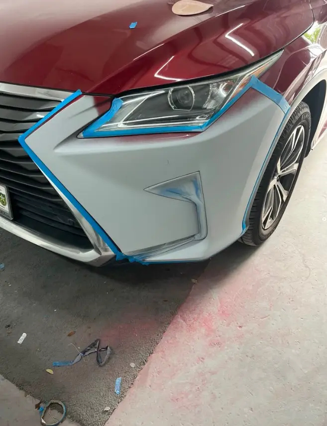 Lexus with front bumper damage before professional repair at CT Collision in Kissimmee, Florida